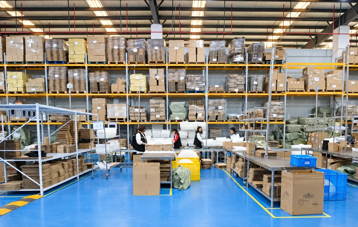 Warehouse racks, cartons and working stations